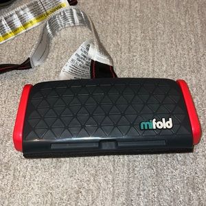 Two Mifold travel booster seats